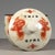 A charming and highly decorative Chinese porcelain lidded jar featuring a beautiful crackle glaze (craquelure) in a warm...