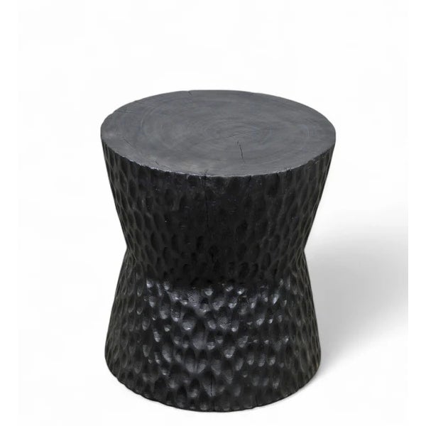 Hand chiseled with a sleek wood grain surface, this contemporary accent table brings a touch of modern and organic style...