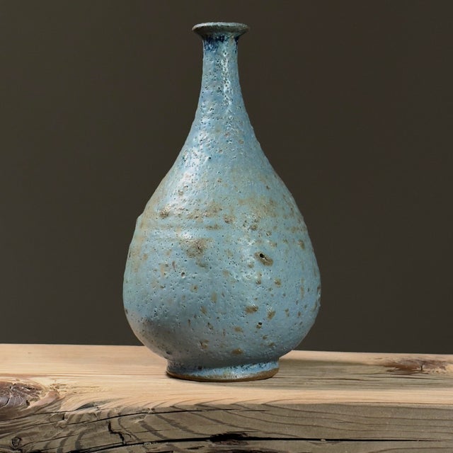 Vintage Long Neck Mid Century Volcanic Glaze Blue Vase by William C. Alexander, Signed. Long neck vase in a dull blue hue...