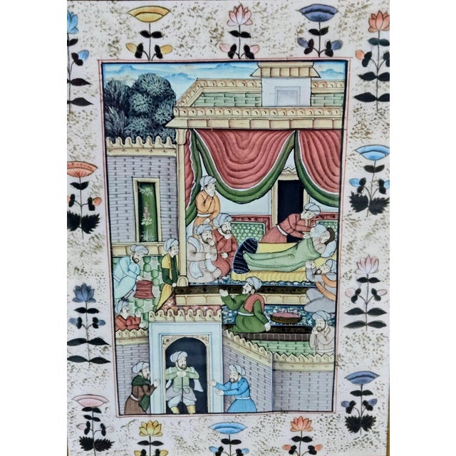 Capture a piece of Mughal history with this exquisitely hand-painted artwork depicting an elaborate courtly scene inspired...