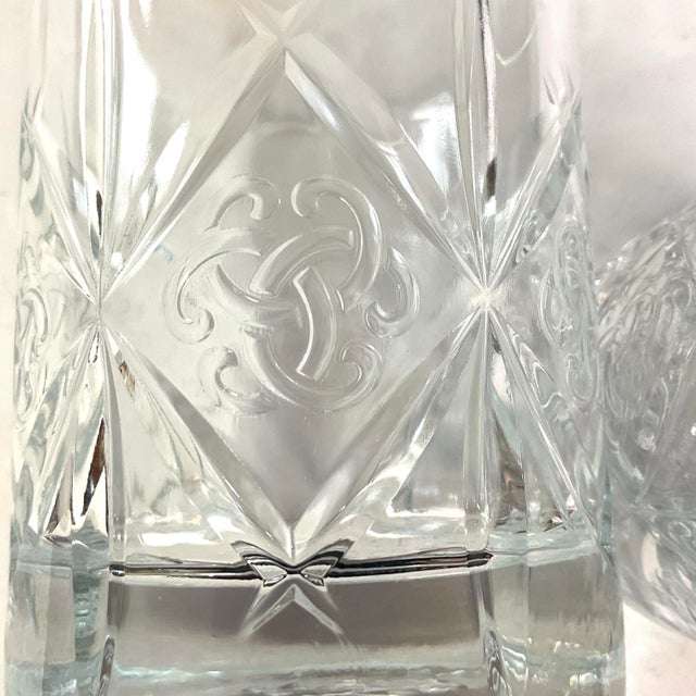 Dewar’s true scotch tumblers – a pair Cut and polished with a weighted bottom with Dewar’s logo on the side and name on...