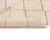 Elegant hand-knotted wool rug, featuring a lattice pattern in a harmonious blend of Ivory and Misty taupe, a versatile...