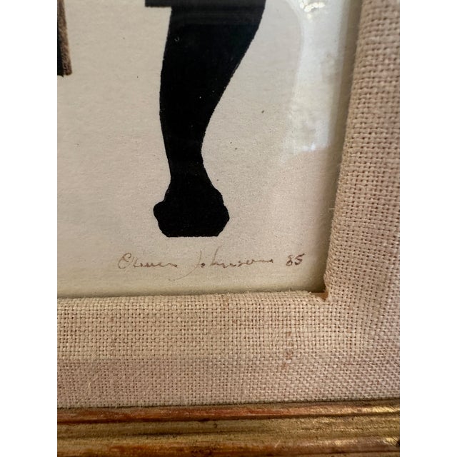 Striking pen and ink art in black and white of a neoclassical armchair and ocelot cat. Handsomely framed in linen and...