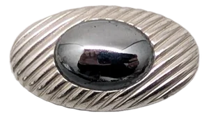 Vintage 1980s Signed Trifari Oval Rhodium Plated Cabochon Faux-Hematite Brooch