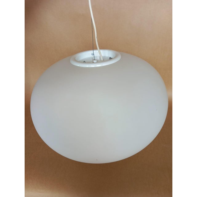 Large opal glass ceiling light. When turned on it gives a particular effect thanks also to the star underneath. The shape...