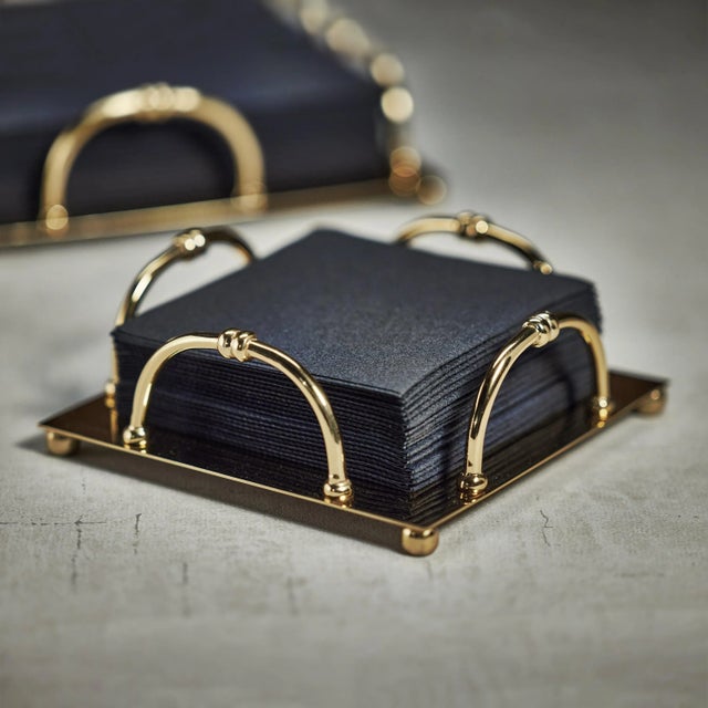 It's time to ditch those soggy napkins that leave your hands all sticky! Our stainless steel gold napkin holder is the...