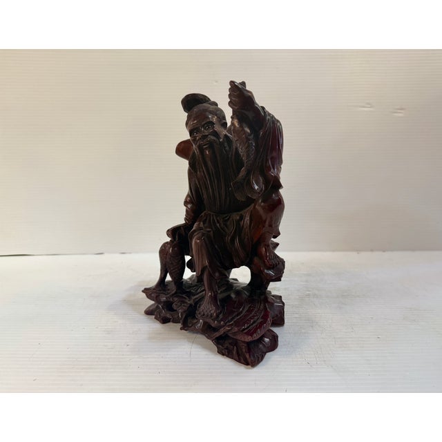 This stunning hand carved state dates back to the Republic of China. The piece is carved from reach wood and spares no...