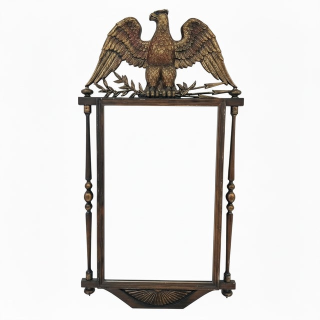 This striking Federal-style wall mirror is a rare, oversized statement piece manufactured by the renowned Burwood Products...