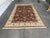 Design Plus Gallery presents a 9ft 2in X 11ft 10in Kashan Persian Rug. The deep red wool rug showcases an intricate floral...