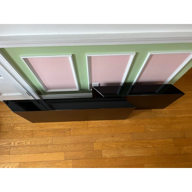 1980 Black Lacquer Floating Console Table. This console table is custom made by the original owner. You can mount the...