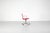 Swivel chair, model "ea 117," in red fabric, metal frame on casters, adjustable height. designed by charles & ray eames...