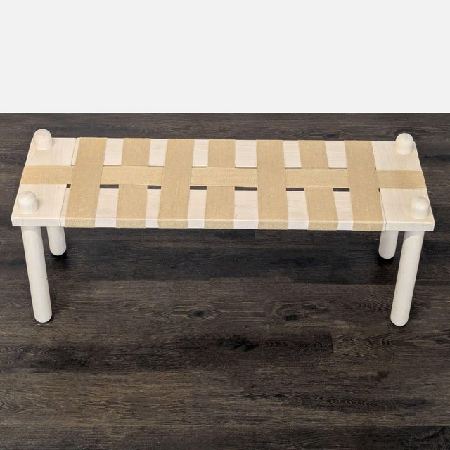 This handmade bench, in an original design, is made of whitewashed maple with jute criss cross webbing. It has rounded...