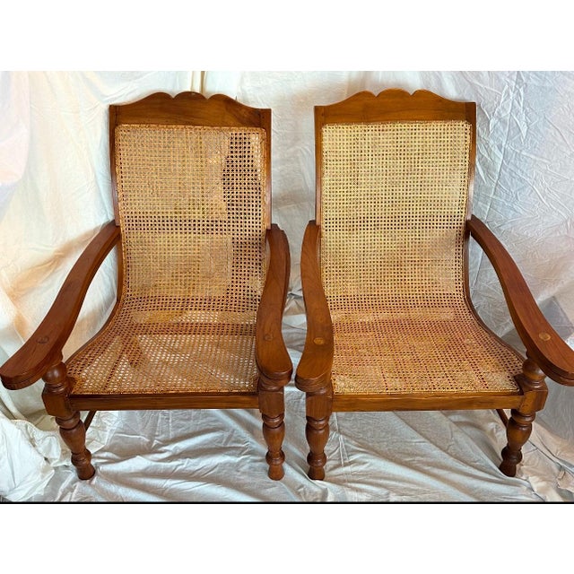 A handsome pair of Indonesian Plantation or Planter’s chairs typically used by Dutch planters. t They are the epitome of...