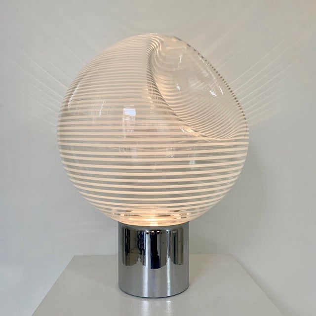 Rare Vistosi Corba model table lamp, circa 1960, Italy. Murano stripped glass, chromed metal. Dimensions: 60 cm H, 45 cm...