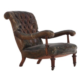 An English Walnut and Tufted Leather Library Armchair by Gillows, 19th C. For Sale