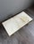A superb gilt bronze coffee table, enhanced by an elegant, veined white marble top with a particularly decorative design....