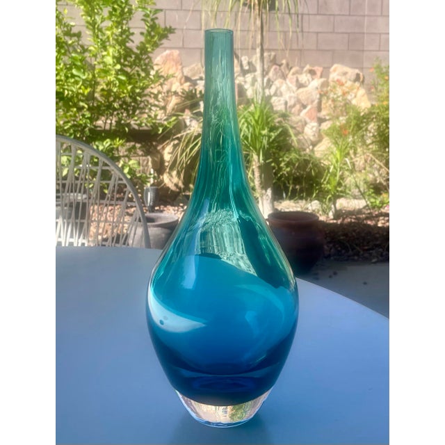 Tall vintage hand-blown narrow mouth blue art glass vase, striking in form and color. c.1970's Dimensions: 4.5"diameter x...