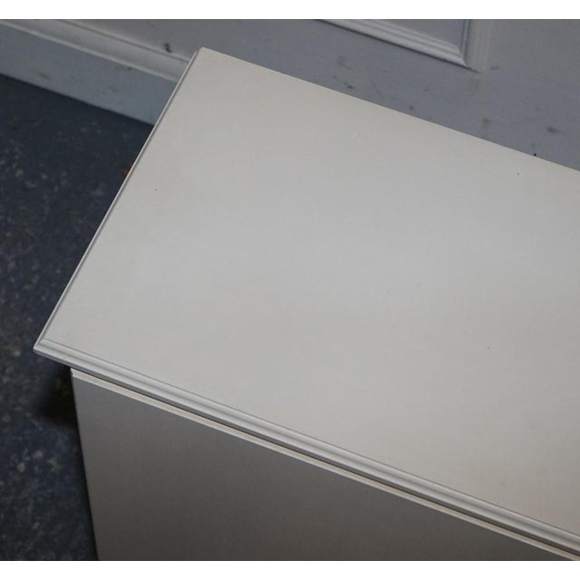 Minimalist Painted White Cupboard with Brass Knobs For Sale - Image 9 of 14