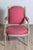 A French Louis XVI style painted wood armchair from the 19th century with carved décor including twisted rope motifs,...