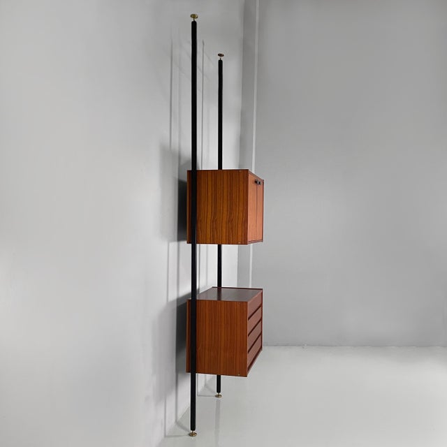 Italian floor to ceiling bookcase in wood, black metal and brass, 1960s Floor-to-ceiling bookcase with single span. It...