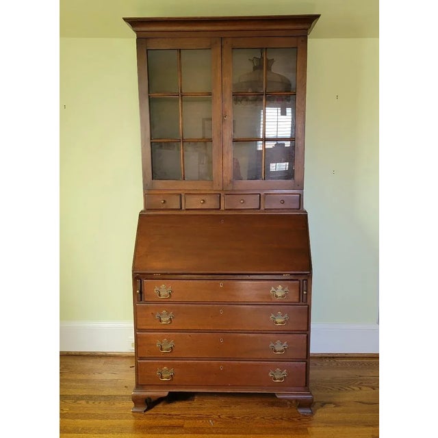 Early 20th C American custom made Chippendale style walnut secretary. Having peg joinery with dovetail and pegged drawers,...