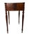 A refined late 19th century Sheraton Revival side table in mahogany, with a compact, versatile form. The rectangular top...