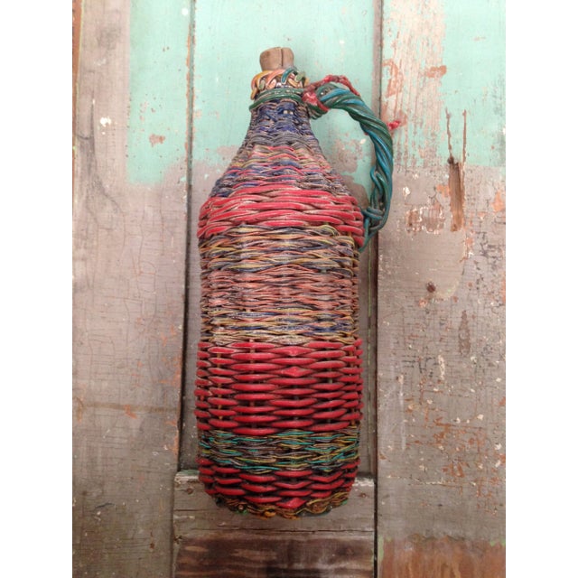 This bottle was imported from Eastern Europe. It was created between 1910 and 1950 by miners who repurposed multi-colored...