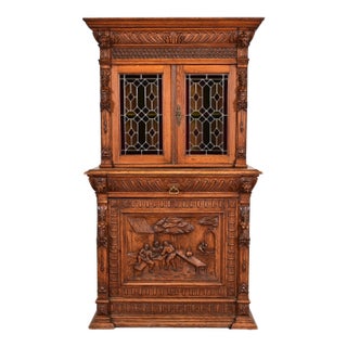 Antique French Renaissance Revival Carved Oak Breakfront Bookcase or Bar Cabinet With Stained Leaded Glass Doors, Circa 1890s For Sale