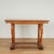 Refined 19th century William IV Anglo Indian console table handcrafted in teak wood featuring a top with a beaded edge and...