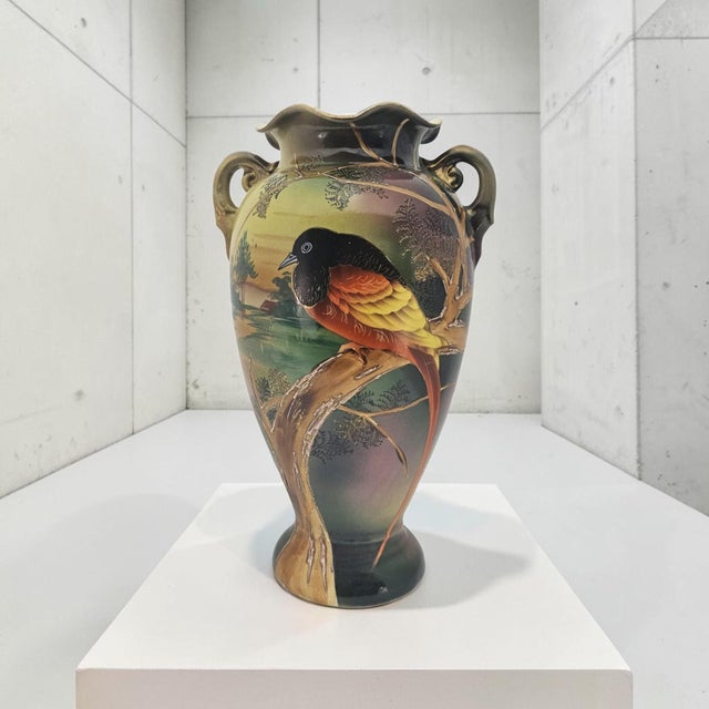 A large early-to-mid twentieth-century Japanese Satsuma-style export earthenware vase, circa 1930s–1950s, formed with a...