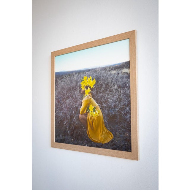 Digital self portrait by Fares Micue. Bright yellow on a neutral background and framed in natural wood.