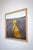 Digital self portrait by Fares Micue. Bright yellow on a neutral background and framed in natural wood.