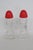 This beautiful Pair of Salt and Pepper Shakers is made of glass with plastic lids. Both Shakers in this lovely set present...