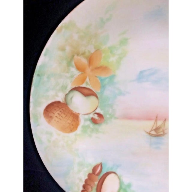 This is a beautiful antique hand painted Limoge oysters and a sailboat plate that measures 8 5/8” in diameter. Please see...