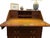 An exceptional 18th-century slant front desk in rich mahogany with authentic leather writing surface. This distinguished...