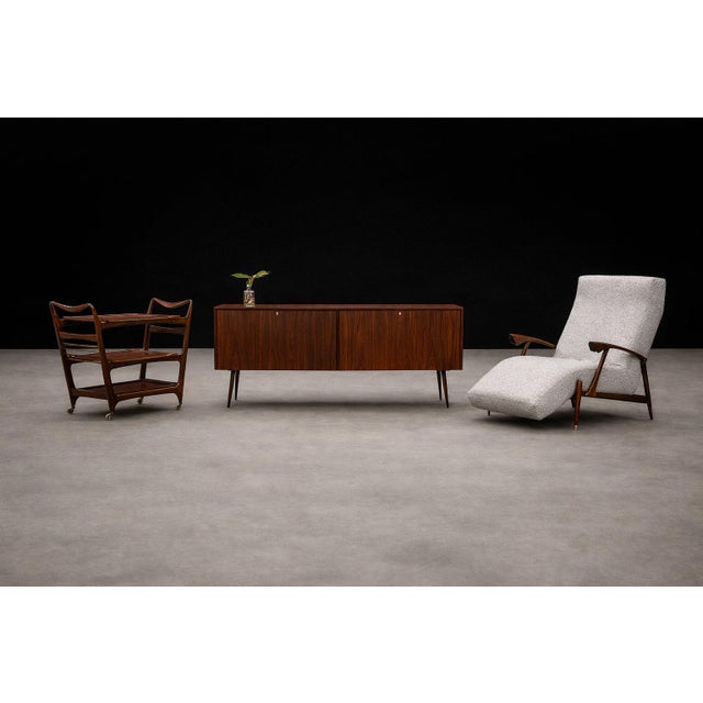A sculptural and highly refined Brazilian modern bar cart designed by Carlo Hauner and Martin Eisler, produced in the...