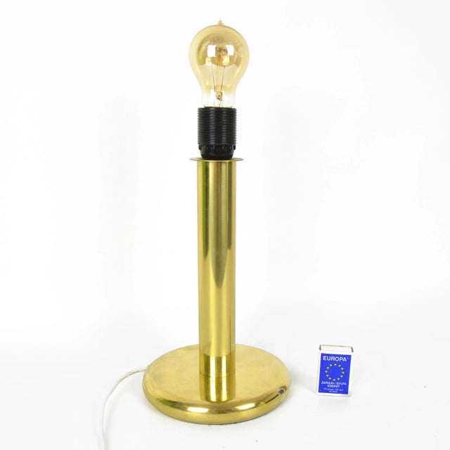 The German table lamp type 747 by ROGO Leuchten comes from the 1980s. The item is in good condition. The lamp in the...