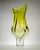 A large vase made of hand-formed glass, in a beautiful lime green color! It comes from the Chribska glassworks in...