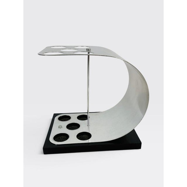 Very nice Aluminum and wood umbrella stand from 70's. in good condition