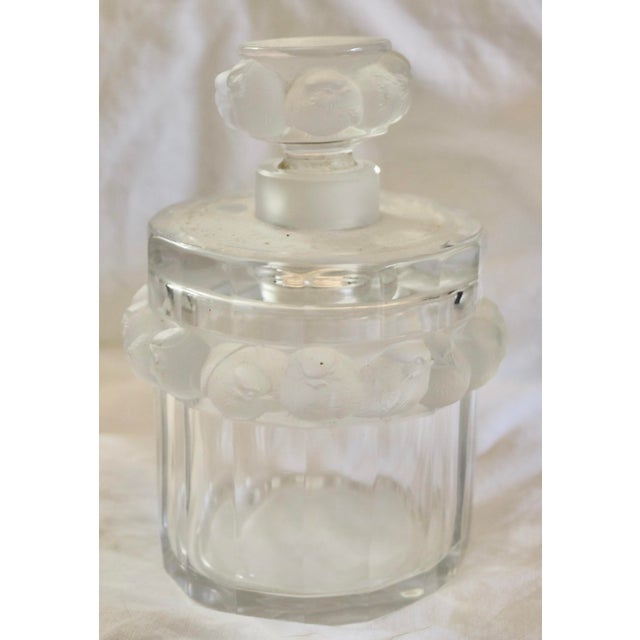 Vintage Lalique Birds Crystal Perfume Bottle With Stopper made in France. This bottle is in a classical Lalique design of...