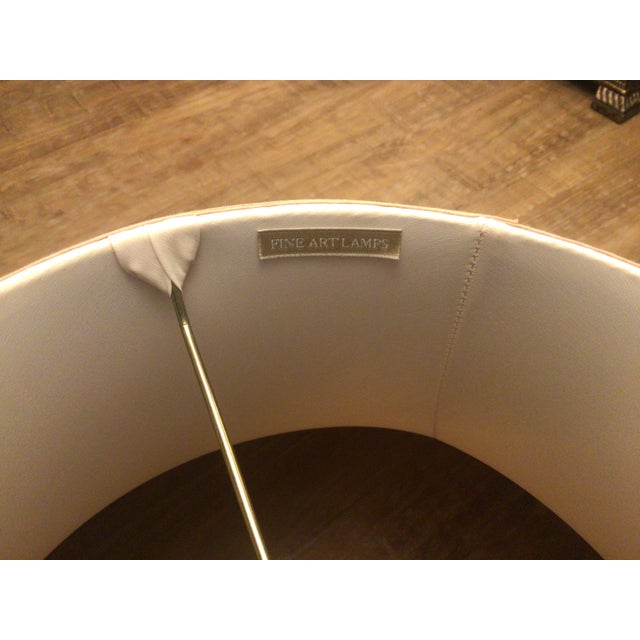 An exceptional and rare find for the discerning collector or interior designer. This matched pair of grand-scale table...