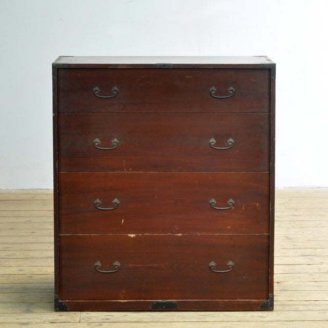 Traditional Japanese Tansu chest of drawers from the 1890s. Manufactured during the late Meiji era (1868-1912). This piece...