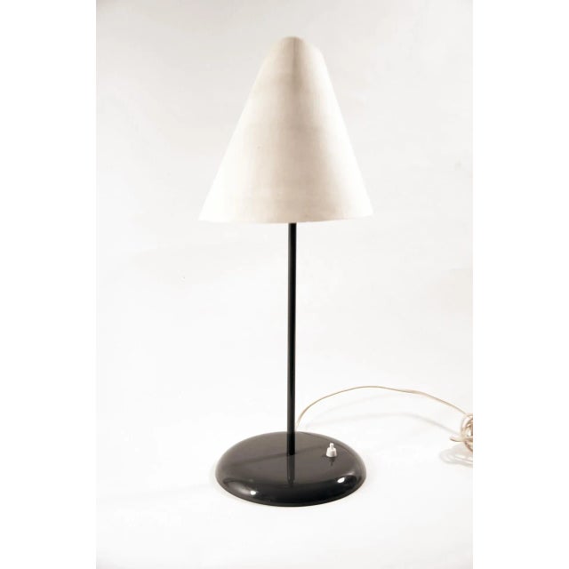 This 'Lalune sous le chapeau' (Lalune Under the Hat) table lamp was designed by Man Ray circa 1973. This piece is...