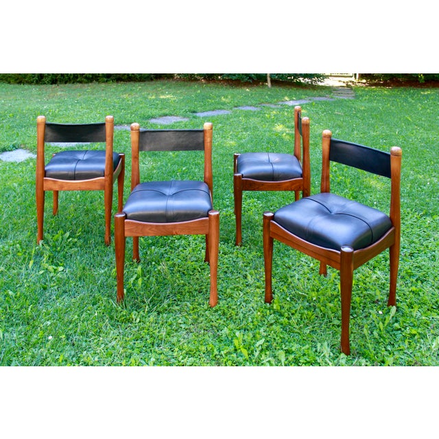 This refined set of dining chairs, designed by Silvio Coppola for Bernini, is a remarkable example of Italian design from...