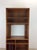 This Danish Modern teak shelving unit features pressed wood construction, teak veneer with original finish, two adjustable...