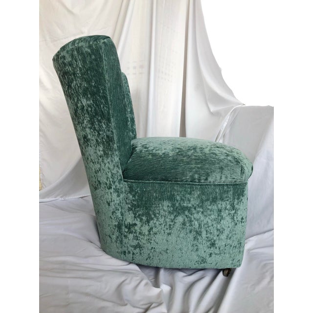 Elegant slipper chair newly upholstered in teal velvet. The curved & ribbed back design fit the back like a glove. It has...