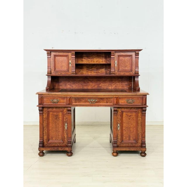 For sale is this impressive writing desk from the Gründerzeit period, captivating with its imposing appearance and superb...