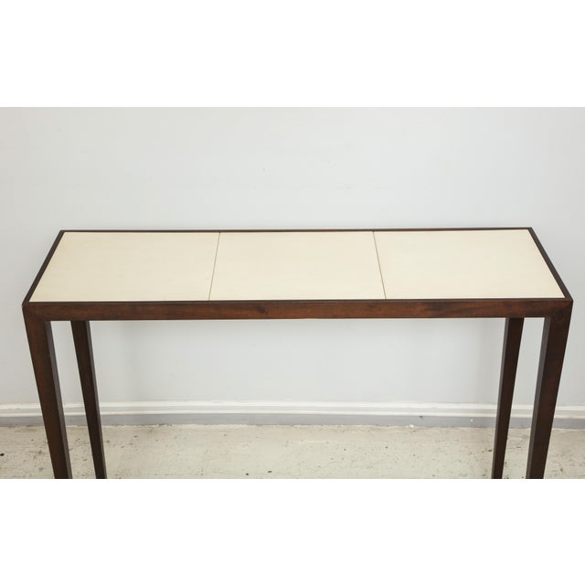 Bespoke Parchment top mahogany console table in the Jean-Michel Frank manner.