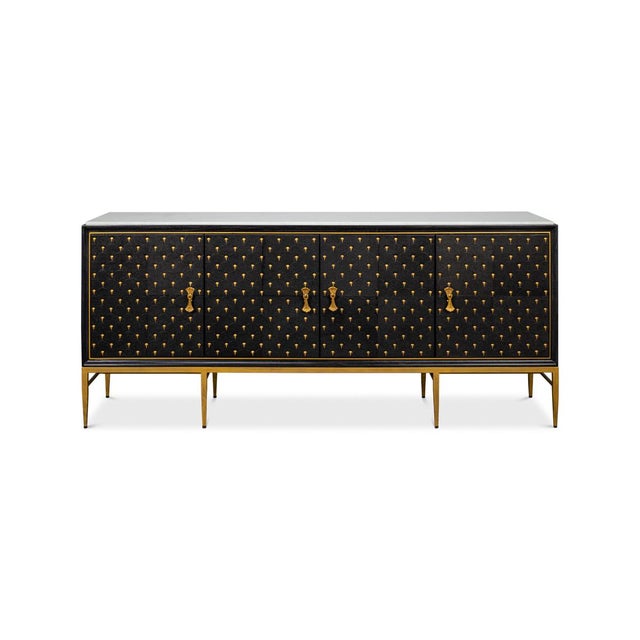 This beautifully crafted sideboard is a striking example of mid-century modern design reimagined for contemporary living....