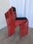 SET of 6 tubular dining chairs. The red metal base and black fabric seat give the chair a great contrast. Chairs were made...